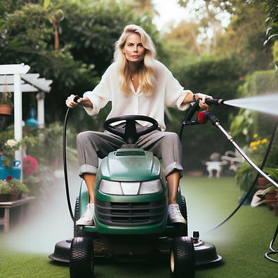 Photo of a  woman riding a lawn mower holding a pressure washer